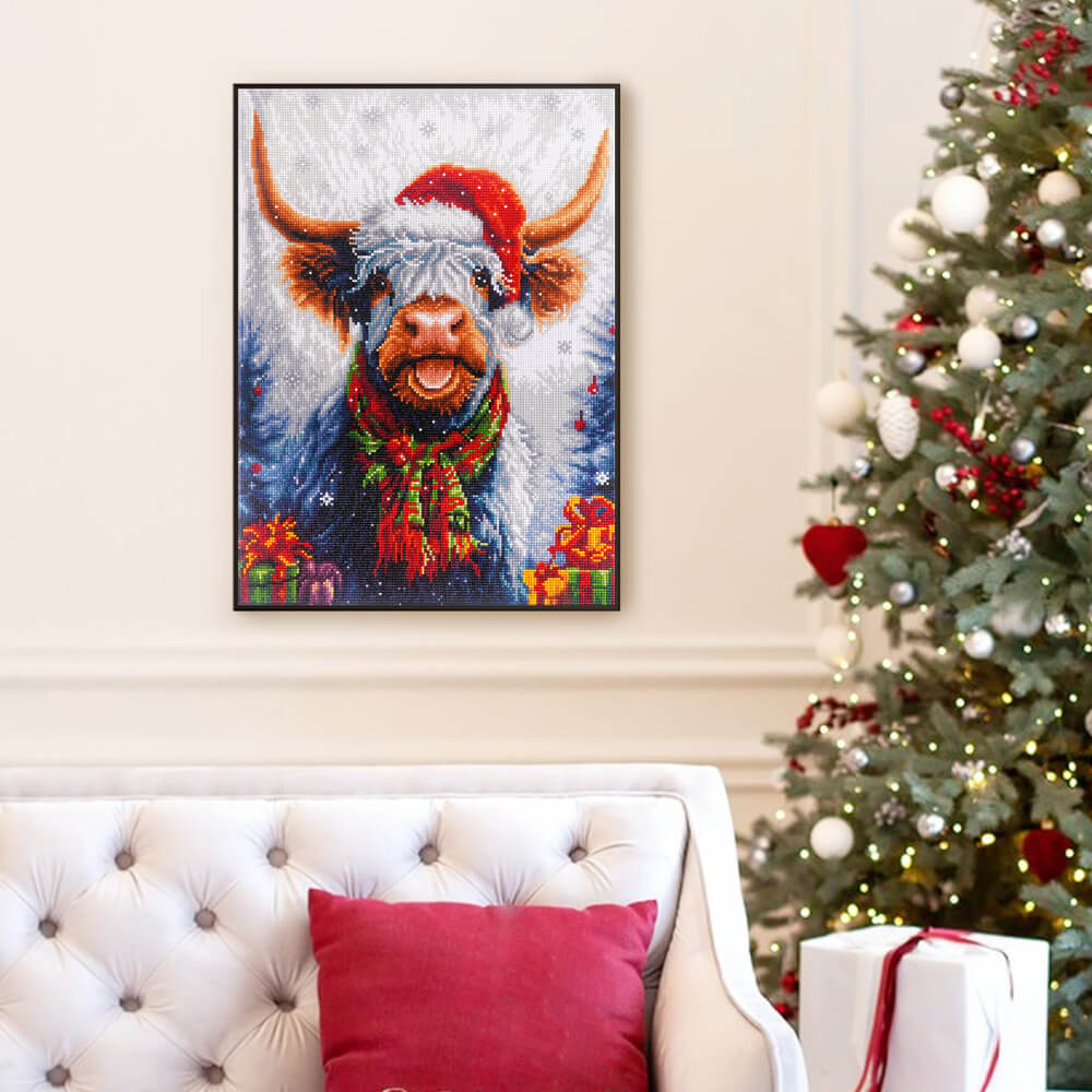 Holiday Highland diamond painting displayed as wall décor with Christmas tree