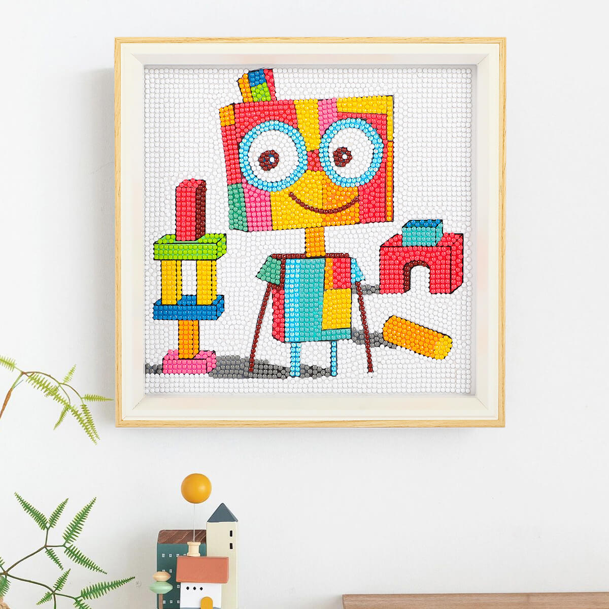 Step-by-step drilling process for The Player robot diamond painting